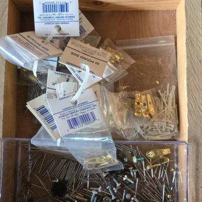 Assortment of home hardware - new caster wheels - screws - nails - Large rat traps - new in the bag hardware