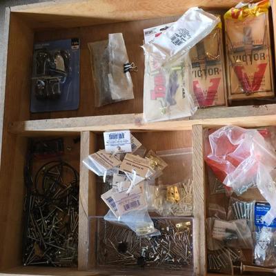 Assortment of home hardware - new caster wheels - screws - nails - Large rat traps - new in the bag hardware