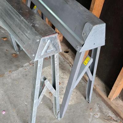 Two metal foldable / collapsable sawhorses