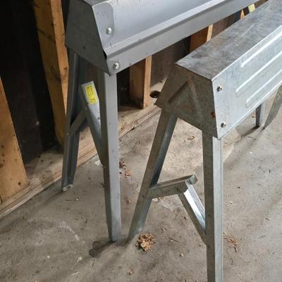 Two metal foldable / collapsable sawhorses