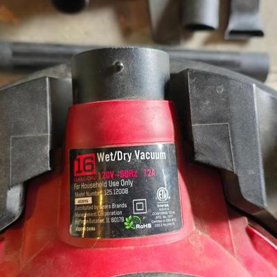 Craftsman 16 gallon wet/dry vacuum with removable blower and several attachments and extension cord.
