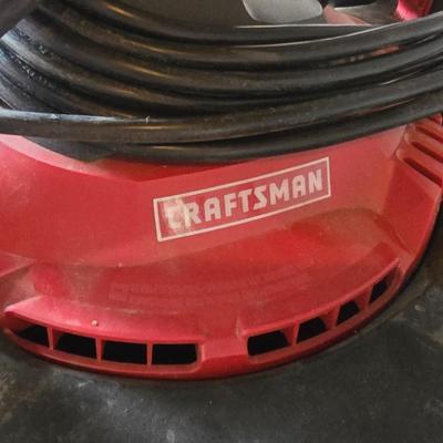 Craftsman 16 gallon wet/dry vacuum with removable blower and several attachments and extension cord.