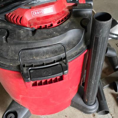 Craftsman 16 gallon wet/dry vacuum with removable blower and several attachments and extension cord.