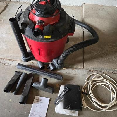 Craftsman 16 gallon wet/dry vacuum with removable blower and several attachments and extension cord.