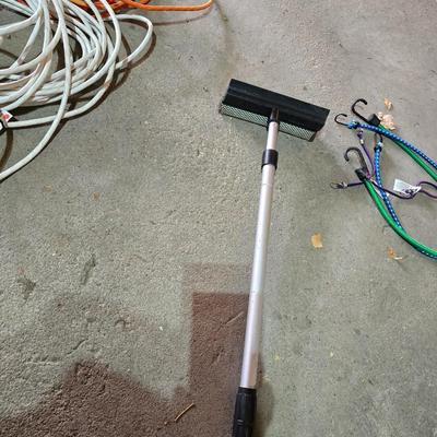 Two extension cords, a handing light and a few bungee cords