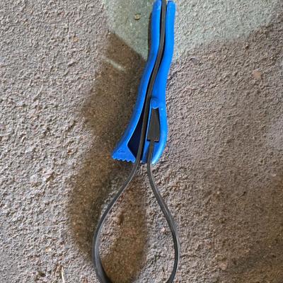 Two extension cords, a handing light and a few bungee cords