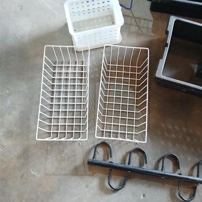 Grouping of storage baskets and racks and a multi-use metal organizer rack