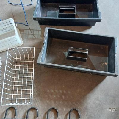 Grouping of storage baskets and racks and a multi-use metal organizer rack