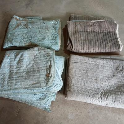 4 moving pads - need a good cleaning - also great for pet blankets