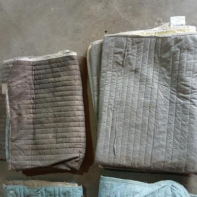 4 moving pads - need a good cleaning - also great for pet blankets