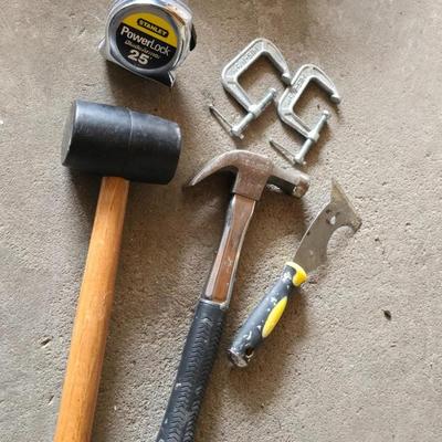 Tools - Rubber mallet - Claw hammer - two C Clamps - Stanley tape measure and a scraper tool
