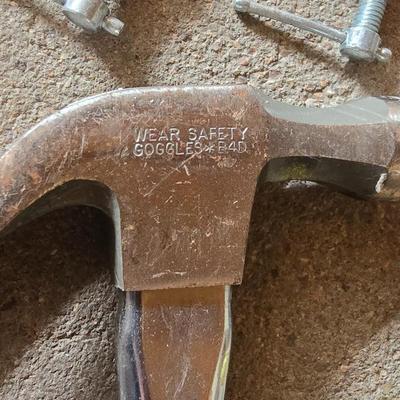 Tools - Rubber mallet - Claw hammer - two C Clamps - Stanley tape measure and a scraper tool