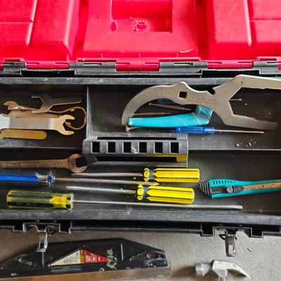 Small craftsman toolbox with an assortment of tools