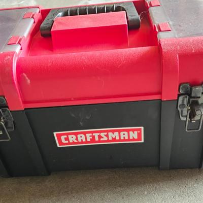 Small craftsman toolbox with an assortment of tools
