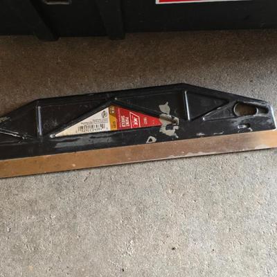 Small craftsman toolbox with an assortment of tools