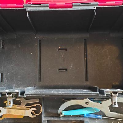 Small craftsman toolbox with an assortment of tools
