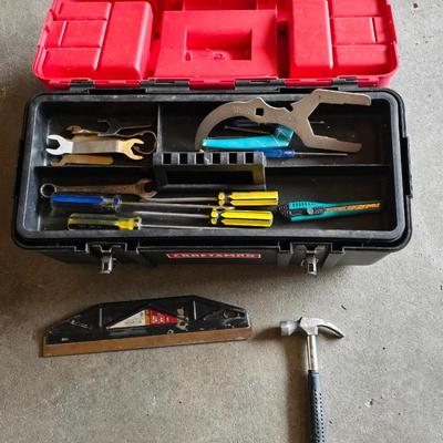 Small craftsman toolbox with an assortment of tools