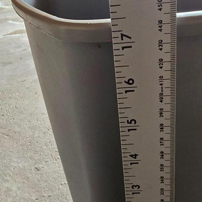 Wood 2 foot step ladder and a grey plastic trashcan