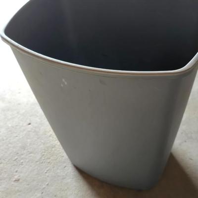 Wood 2 foot step ladder and a grey plastic trashcan