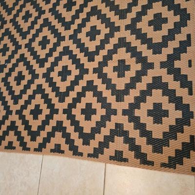 Black and brown reversible outdoor area rug 92.5" x 59"