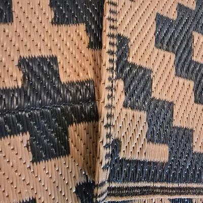 Black and brown reversible outdoor area rug 92.5" x 59"