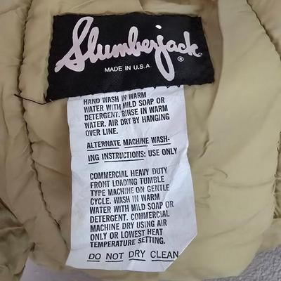 Nice SluAmerican stoneware 10-gallon crockmberjack sleeping bag with a cocoon travel pillow