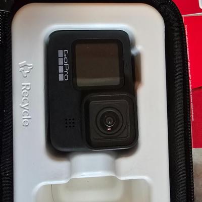 GoPro with Mongoose CM303 Helmet and accessories including two 64 GB UHS scandisk media storage cards