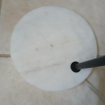Sweeping curve 70"floor lamp with marble like base with adjustable neck