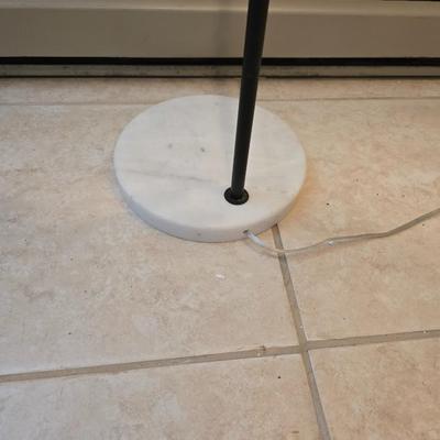 Sweeping curve 70"floor lamp with marble like base with adjustable neck