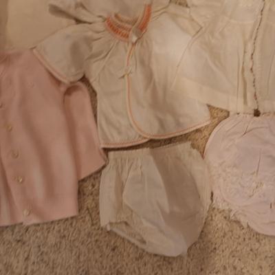 ANTIQUE DOLL DRESS AND OLDER DOLL CLOTHES PLUS RABBIT DISHES