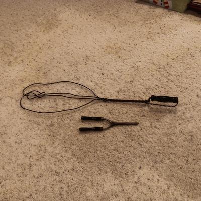ANTIQUE RUG BEATER AND CURLING IRON
