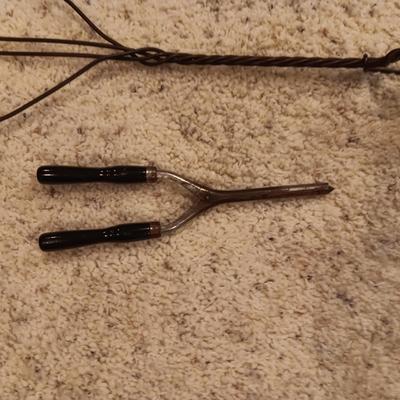 ANTIQUE RUG BEATER AND CURLING IRON