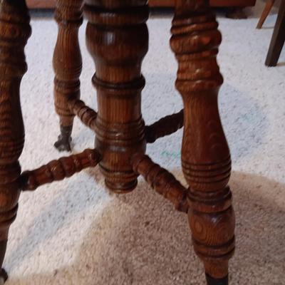 ANTIQUE PIANO STOOL WITH GLASS BALL CLAW FEET