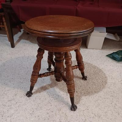ANTIQUE PIANO STOOL WITH GLASS BALL CLAW FEET