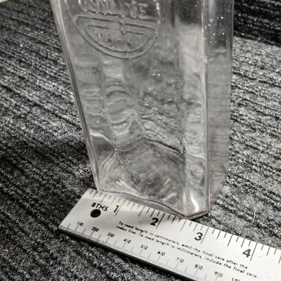 Antique embossed bottle with cork stopper