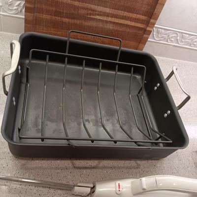 ROWENTA ELECTRIC KNIFE, LARGE TEFLON ROASTING PAN AND A WOODEN CARVING BOARD