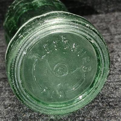 Two vintage Coca Cola Hobble Skirt Glass Soda Bottles marked LEESBURG FLA. - FLORIDA on base