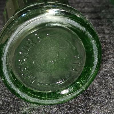 Two vintage Coca Cola Hobble Skirt Glass Soda Bottles marked LEESBURG FLA. - FLORIDA on base