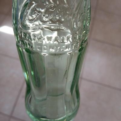 Two vintage Coca Cola Hobble Skirt Glass Soda Bottles marked LEESBURG FLA. - FLORIDA on base