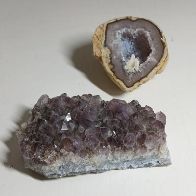 Amethyst slab and heart shaped Geode with shell looking outside.
