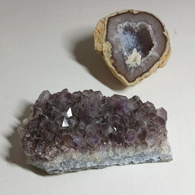 Amethyst slab and heart shaped Geode with shell looking outside.