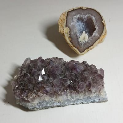 Amethyst slab and heart shaped Geode with shell looking outside.