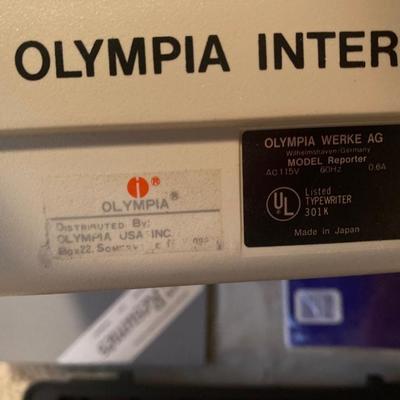 OLYMPIA MANUAL REPORTER TYPEWRITER AND AND PAPER