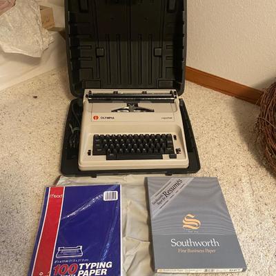 OLYMPIA MANUAL REPORTER TYPEWRITER AND AND PAPER