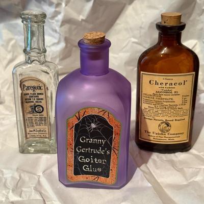 Lot of vintage medical bottles, and some Halloween bottles