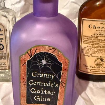 Lot of vintage medical bottles, and some Halloween bottles