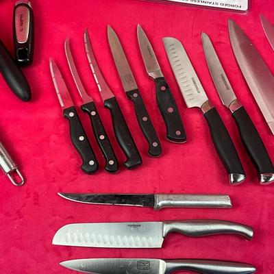 Lot 594 Farberware knives & Utensils Lot