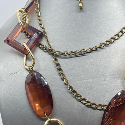 LOT 67: Amber and Goldtone Necklaces