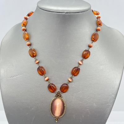 LOT 67: Amber and Goldtone Necklaces