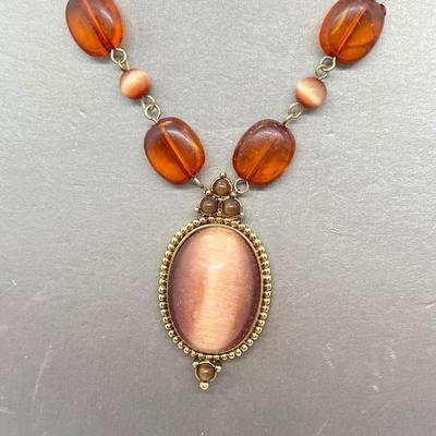 LOT 67: Amber and Goldtone Necklaces